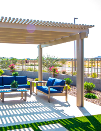 new pergola with blue chairs